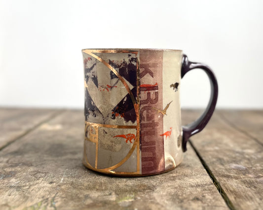 Mug with slip, gold decals and image transfer