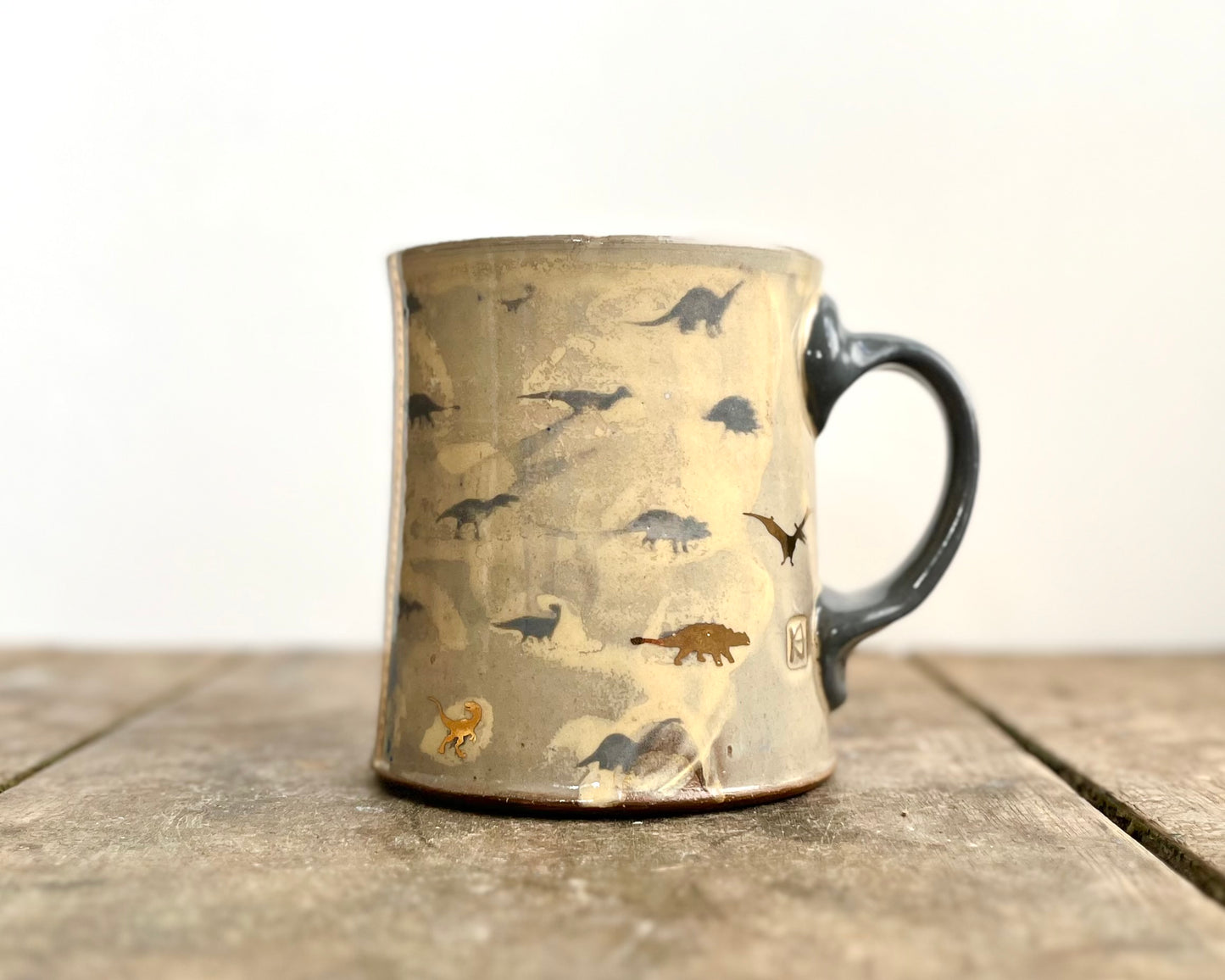 Mug with slip, gold decals and image transfer