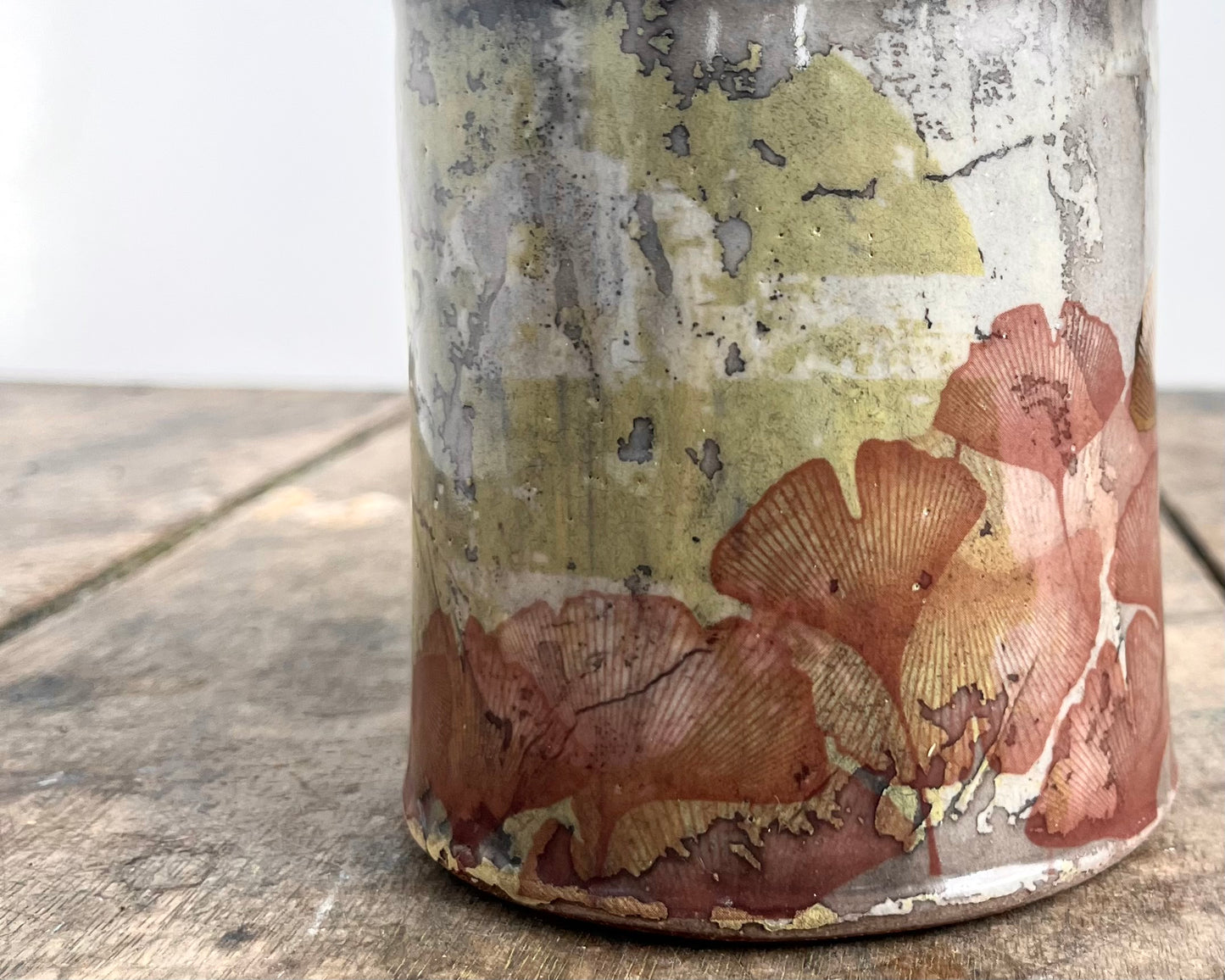 Mug with slip, gold decals and image transfer