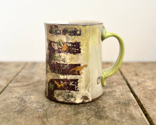 Mug with slip, gold decals and image transfer