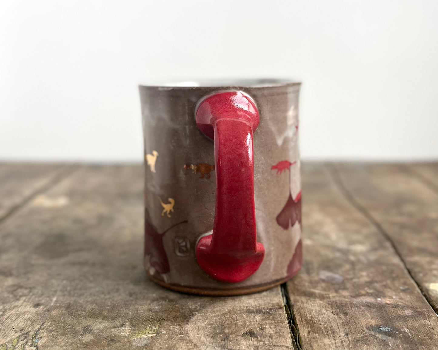 Mug with slip, gold decals and image transfer