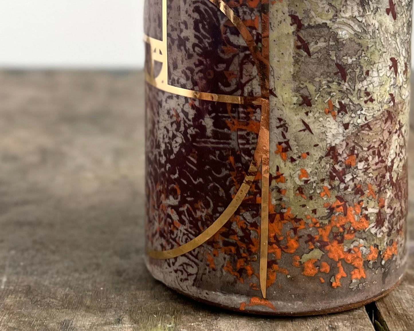 Mug with slip, gold decals and image transfer