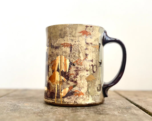 Mug with slip, gold decals and image transfer