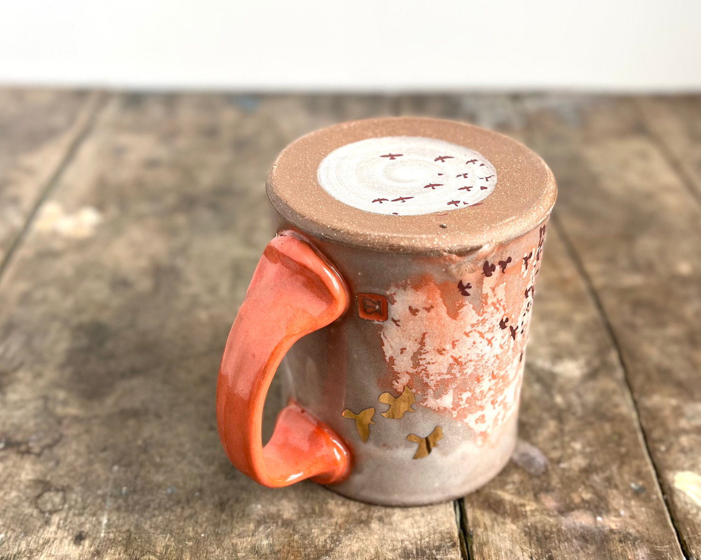 Mug with slip, gold decals and image transfer