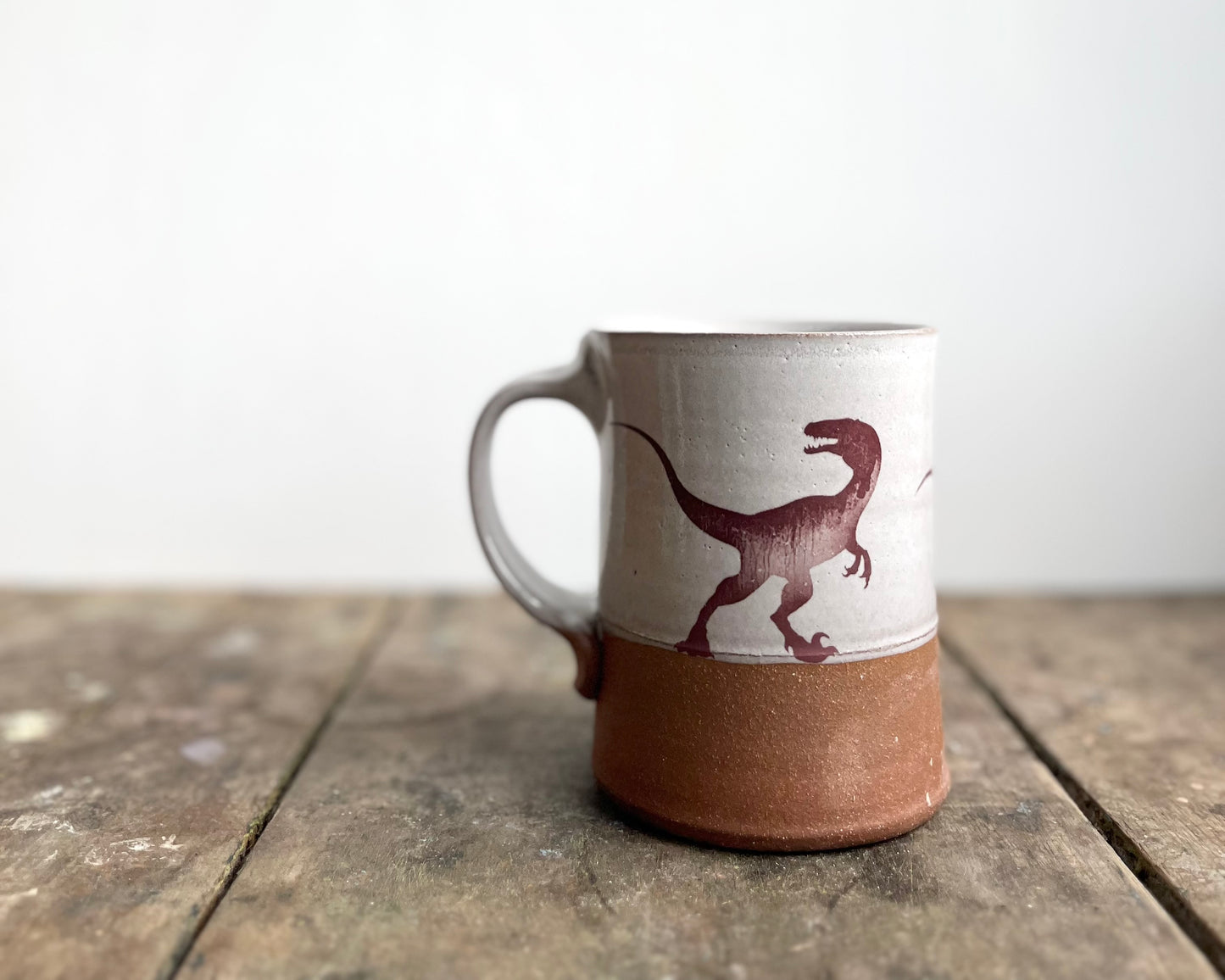 Velociraptor Pack Mug - white