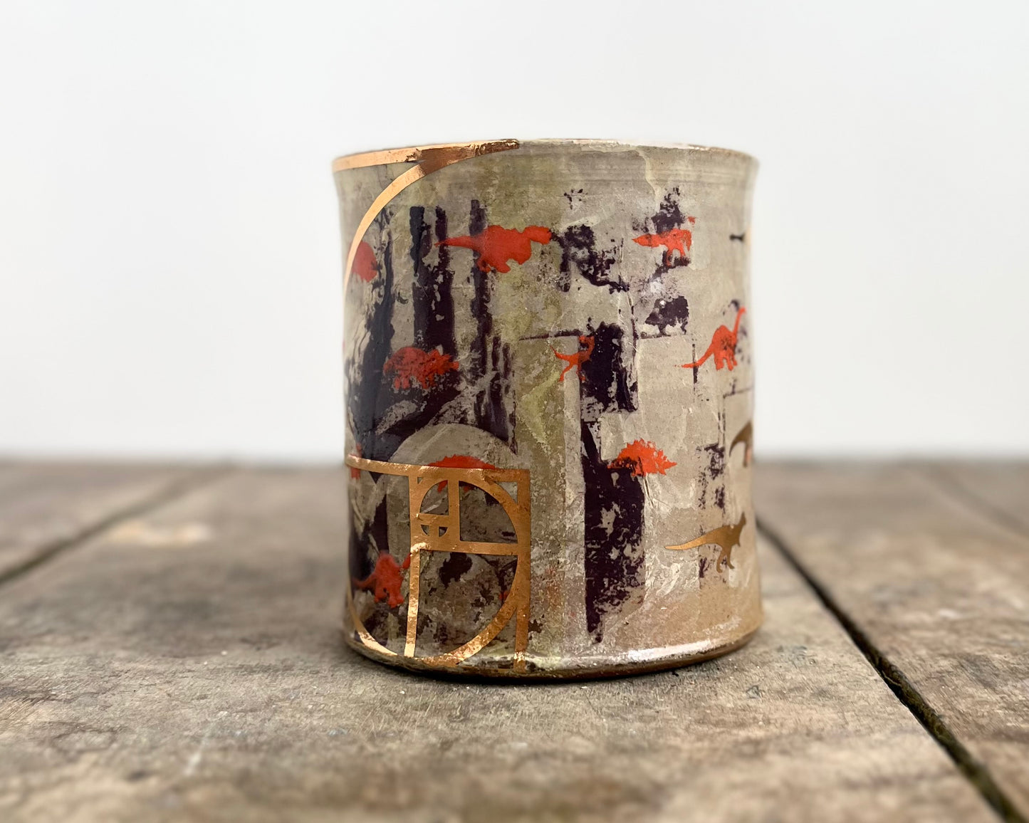 Mug with slip, gold decals and image transfer