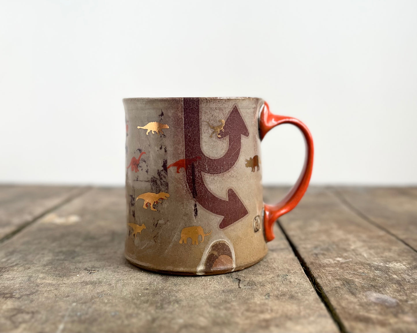 Mug with slip, gold decals and image transfer
