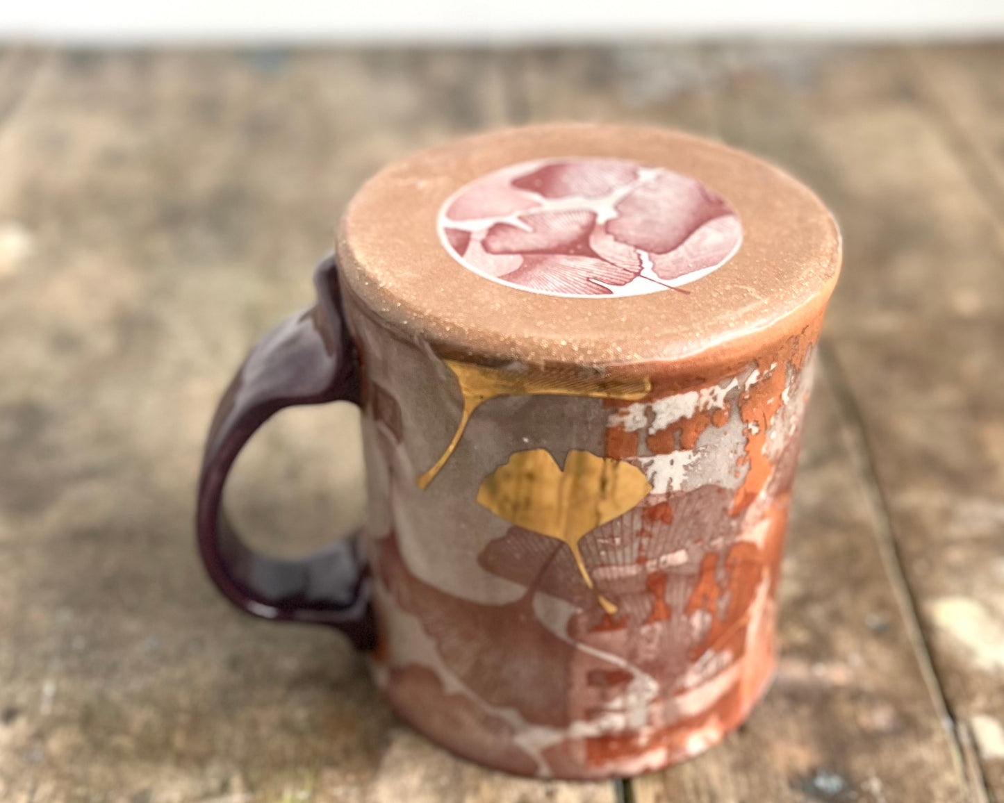 Mug with slip, gold decals and image transfer
