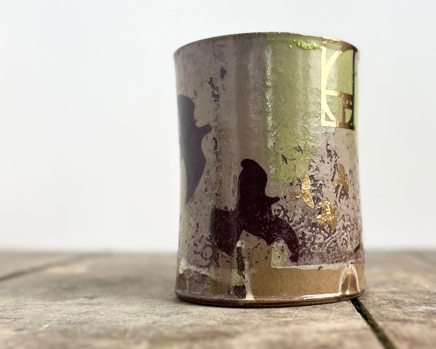 Mug with slip, gold decals and image transfer