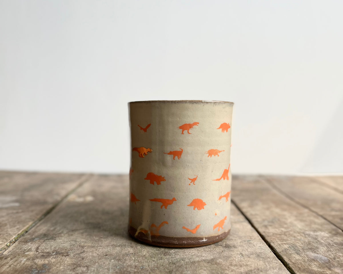Mug with orange handle, gold decals and image transfer