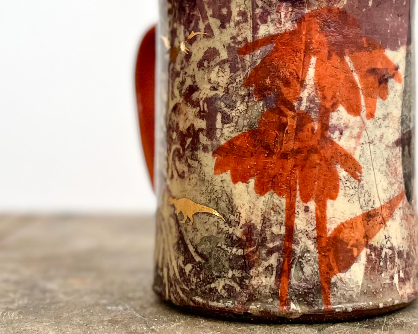 Mug with slip, gold decals and image transfer