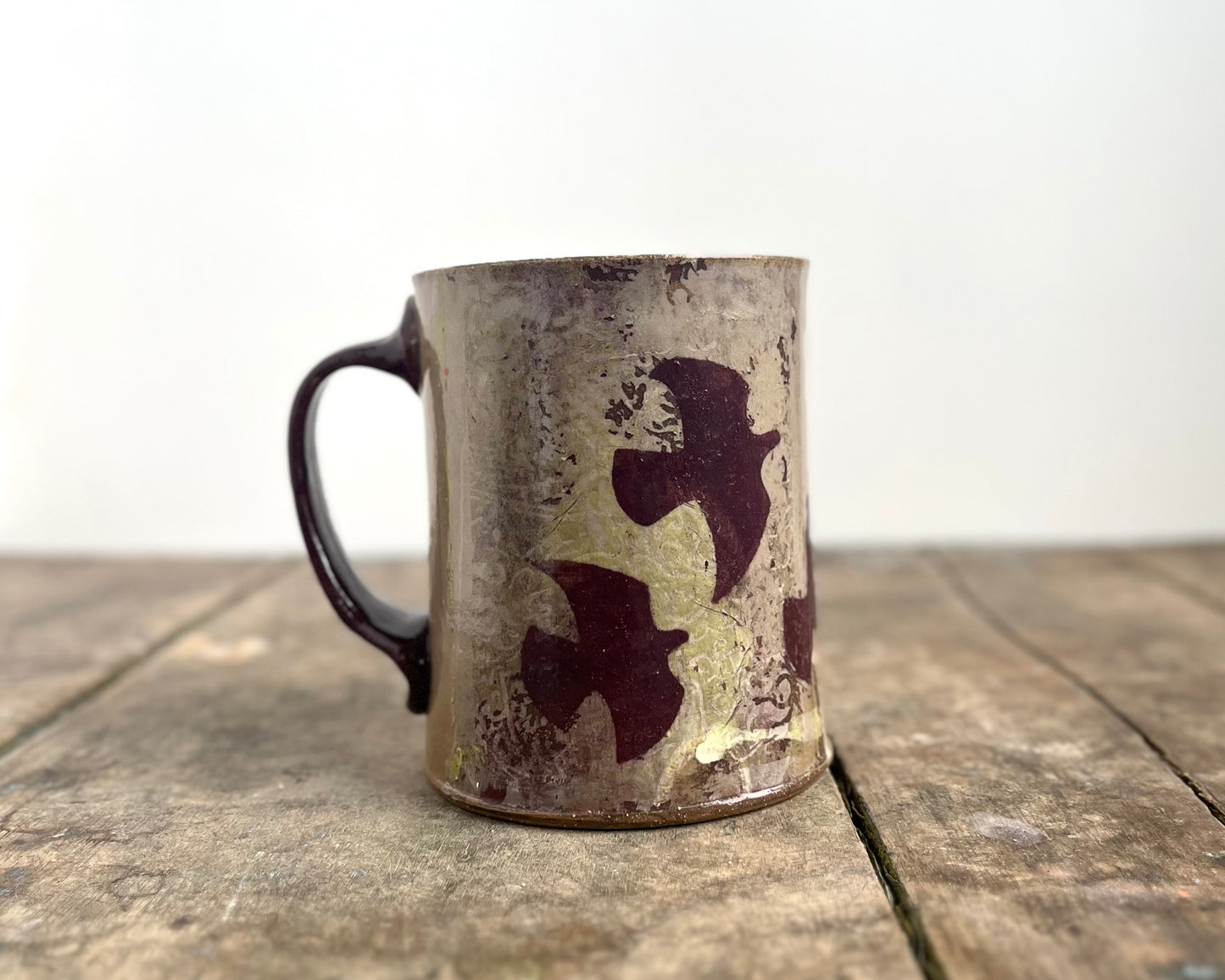 Mug with slip, gold decals and image transfer