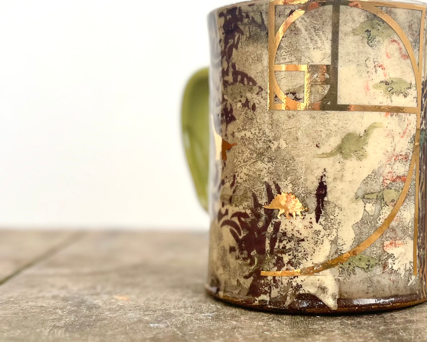 Mug with slip, gold decals and image transfer