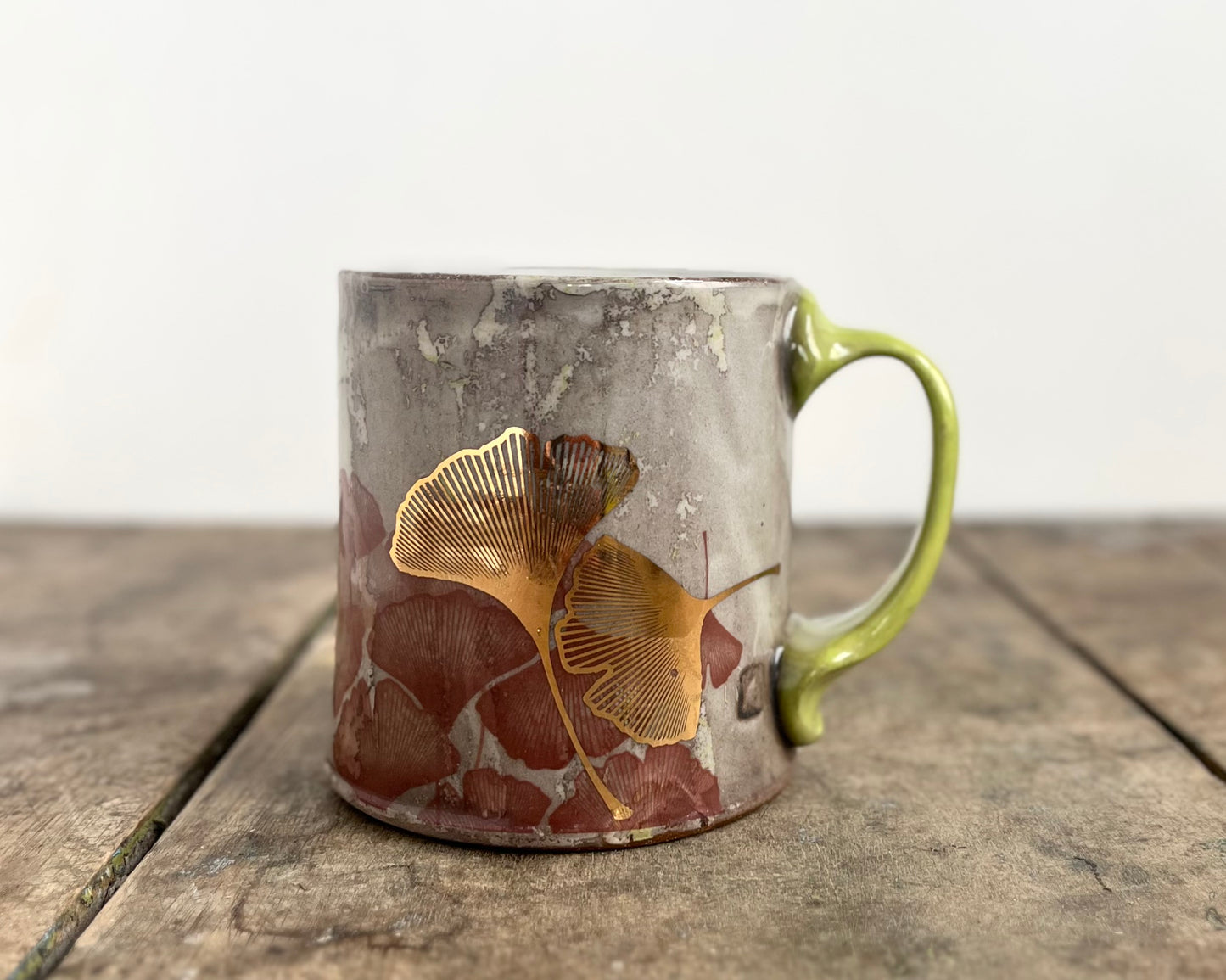 Mug with slip, gold decals and image transfer