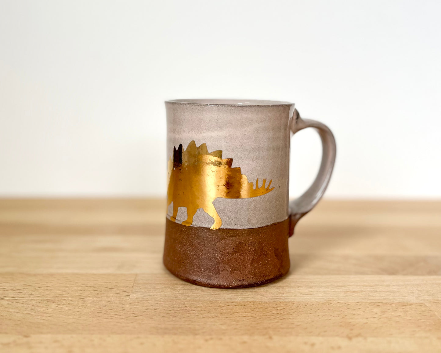 Gold Stegosaurus Mug - pale pink