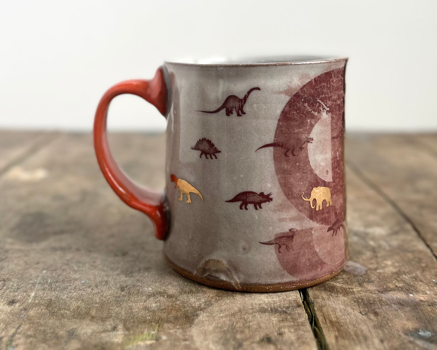 Mug with slip, gold decals and image transfer