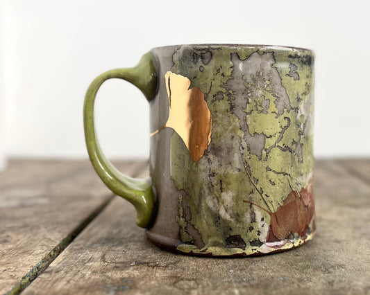 Mug with slip, gold decals and image transfer