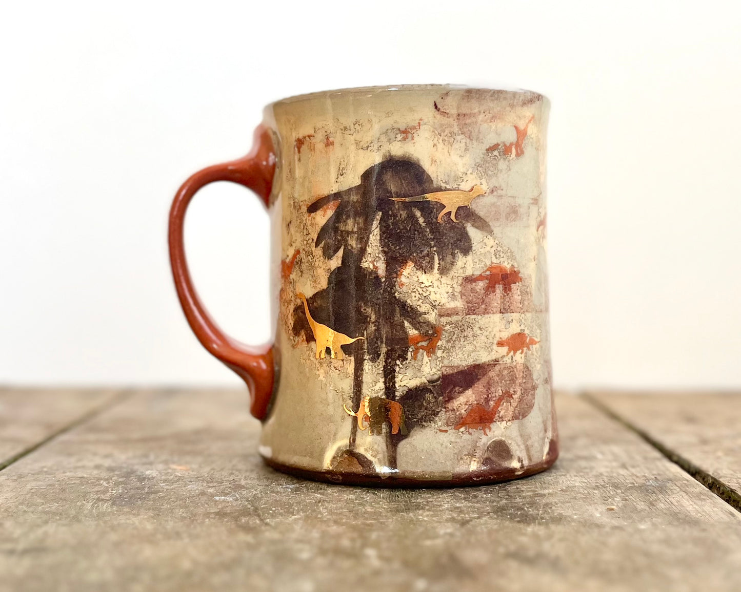 Mug with slip, gold decals and image transfer