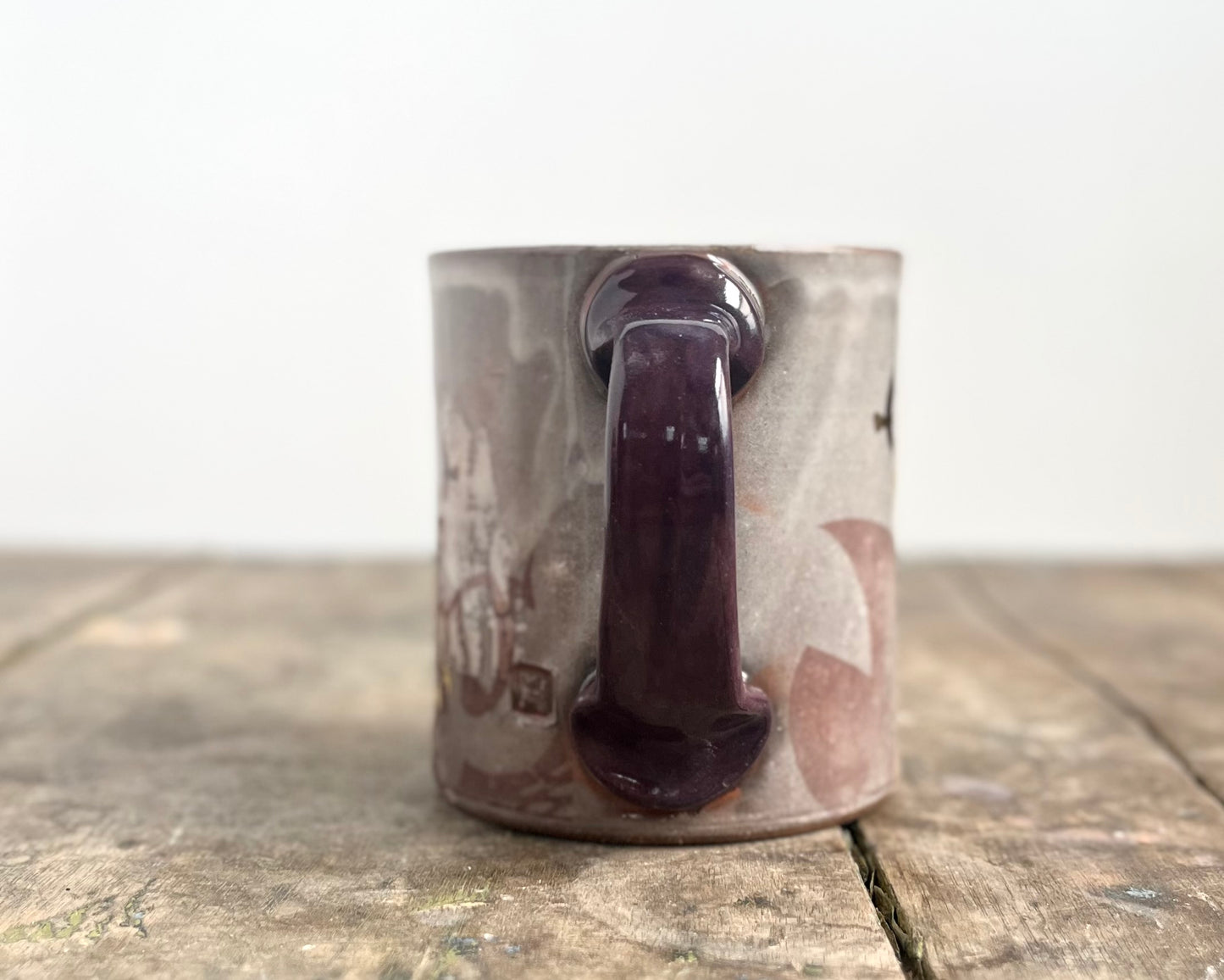 Mug with slip, gold decals and image transfer