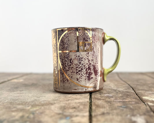 Mug with slip, gold decals and image transfer