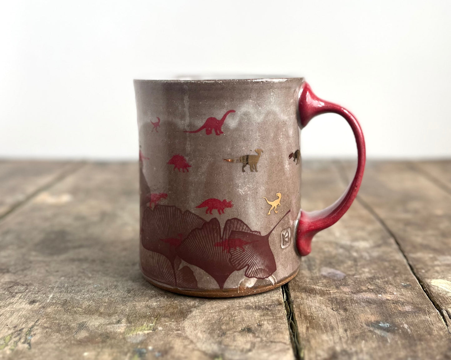 Mug with slip, gold decals and image transfer