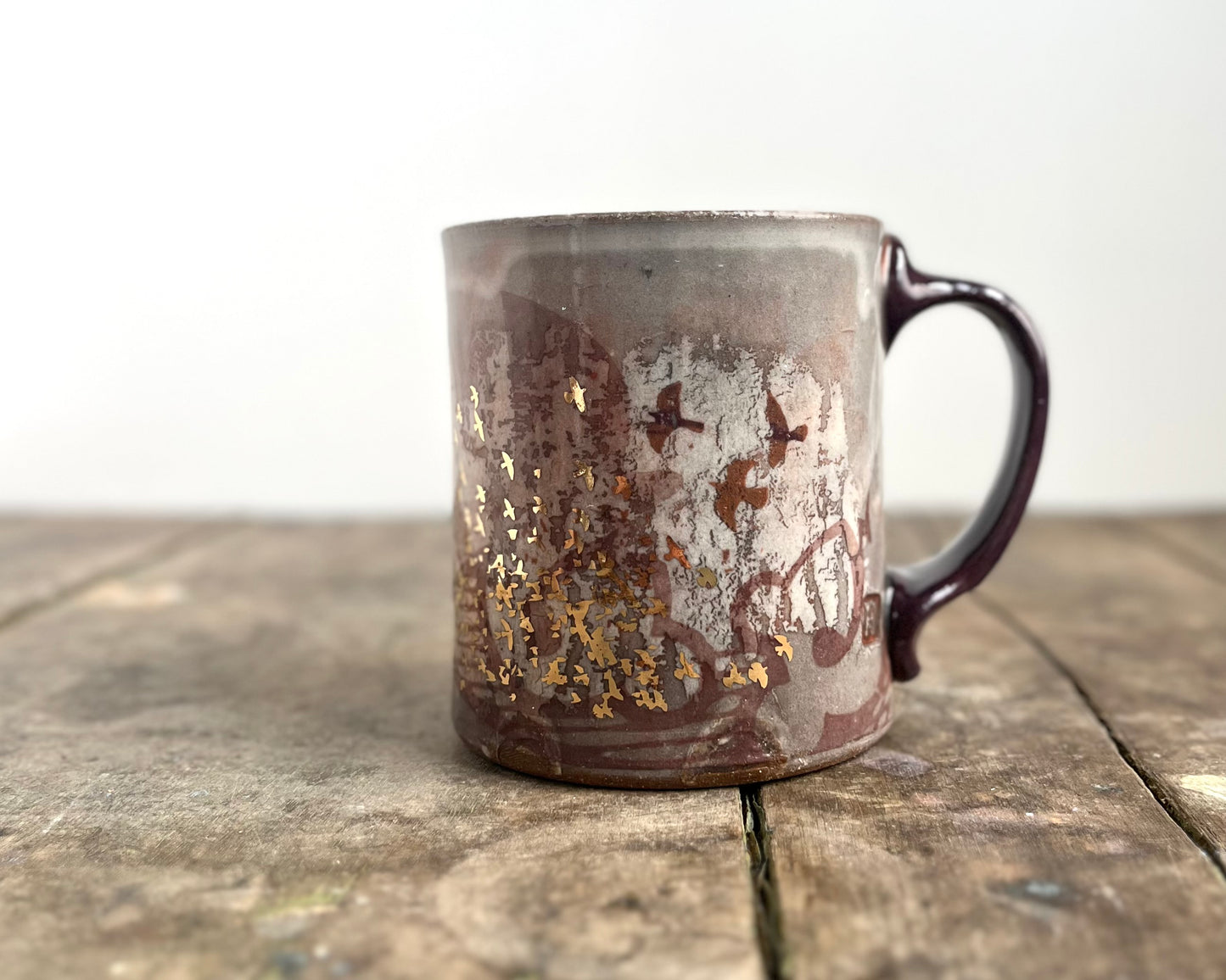 Mug with slip, gold decals and image transfer