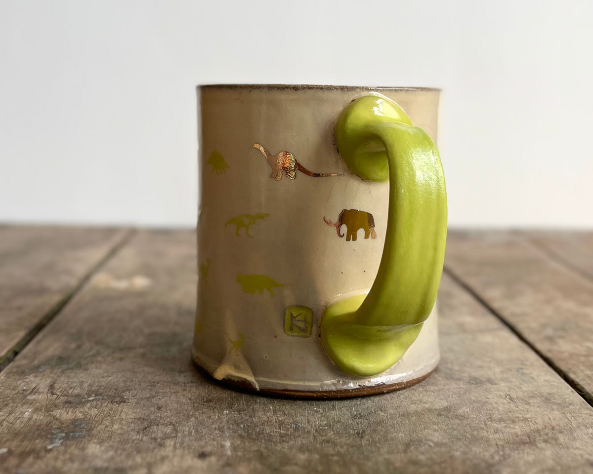 Mug with green handle, gold decals and image transfer