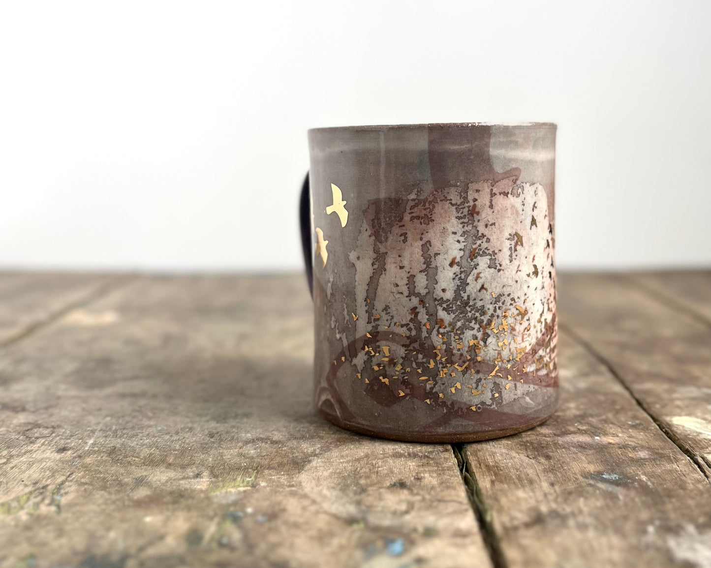 Mug with slip, gold decals and image transfer