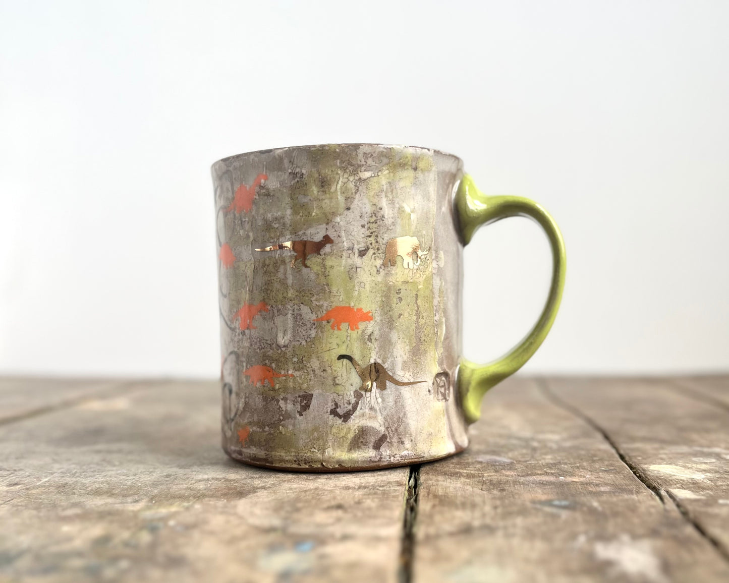 Mug with slip, gold decals and image transfer