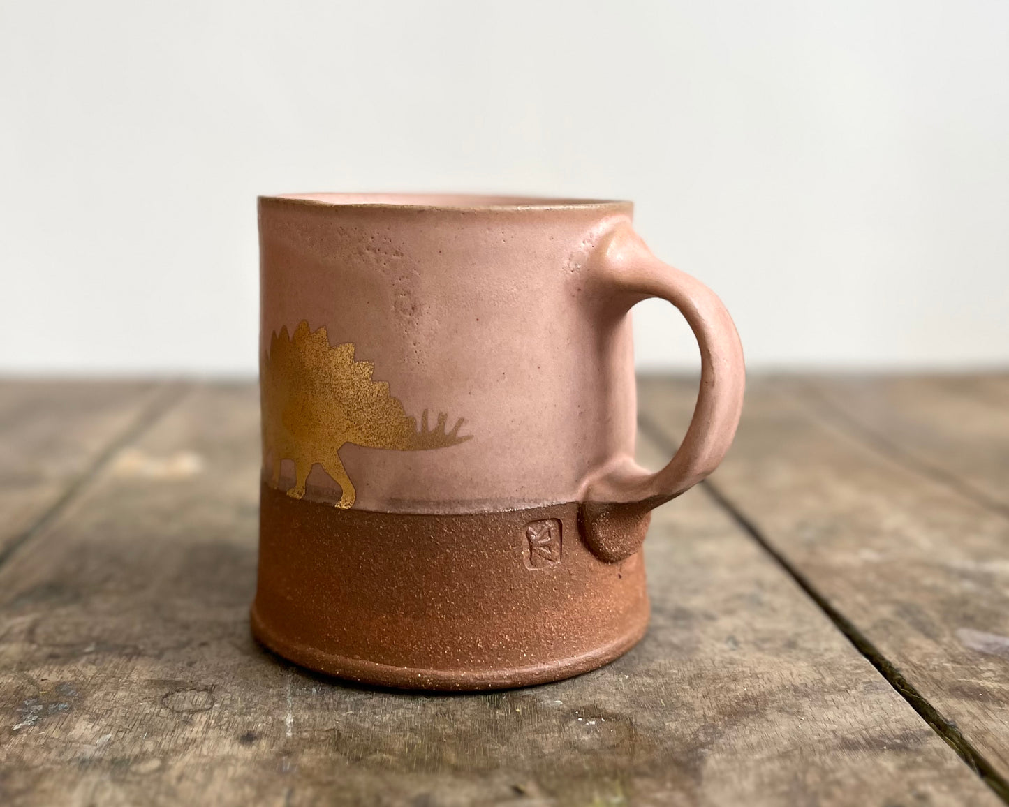 Gold Stegosaurus Americano Mug - pink matte