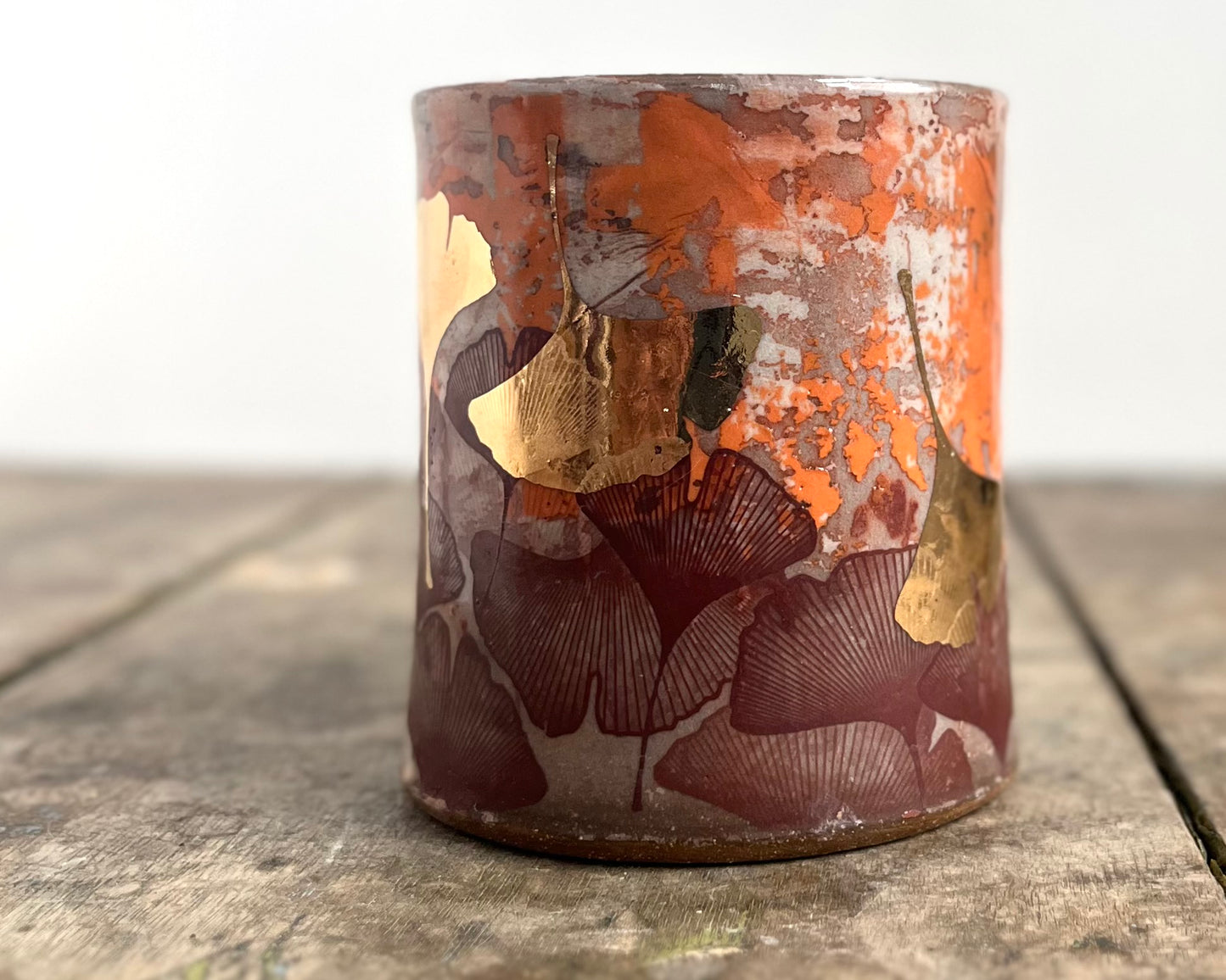 Mug with slip, gold decals and image transfer