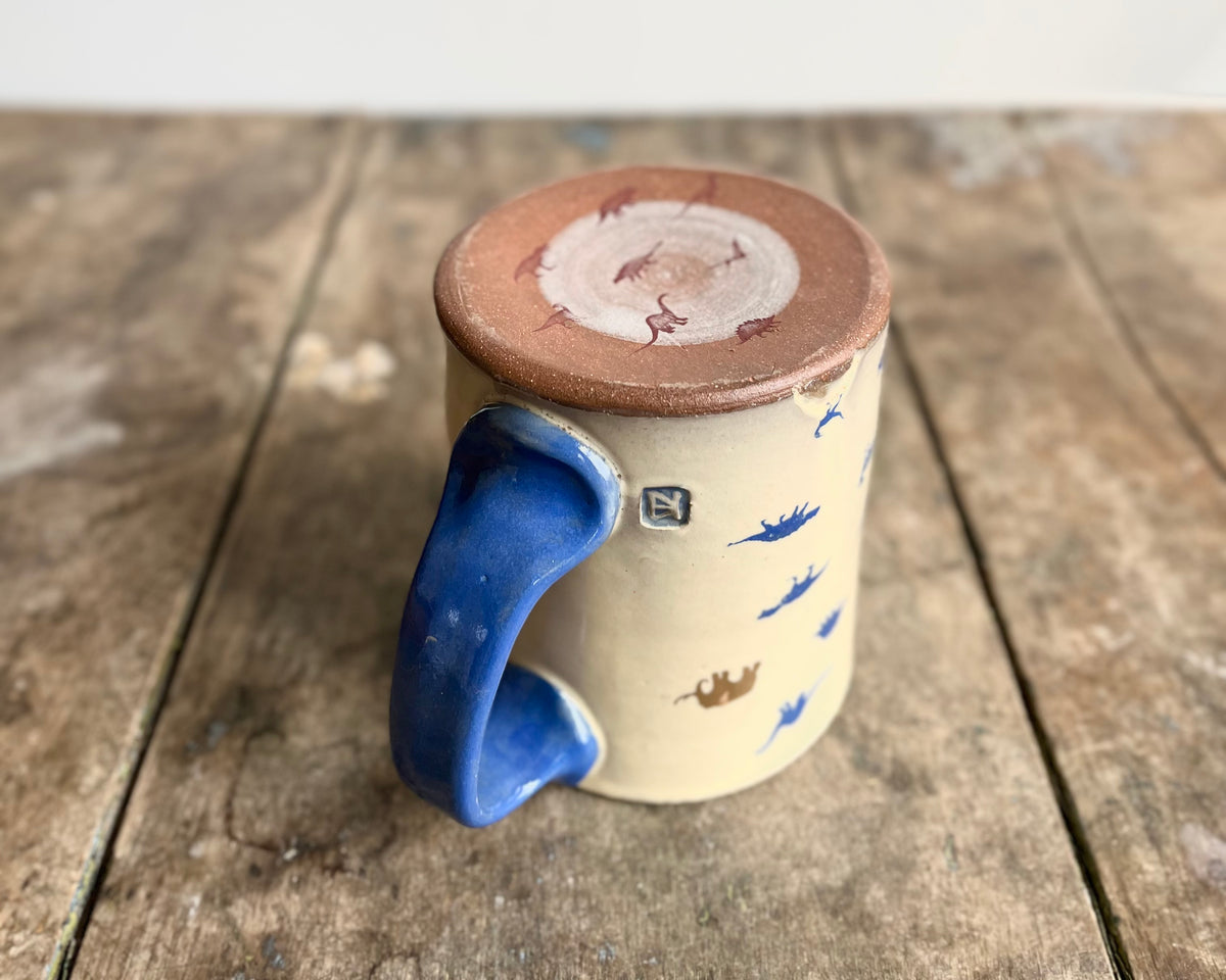 Mug with blue handle, gold decals and image transfer