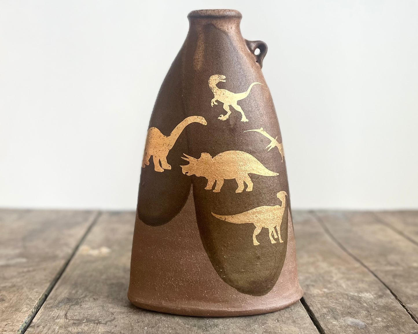 Flattened Vase with Gold Dinosaurs