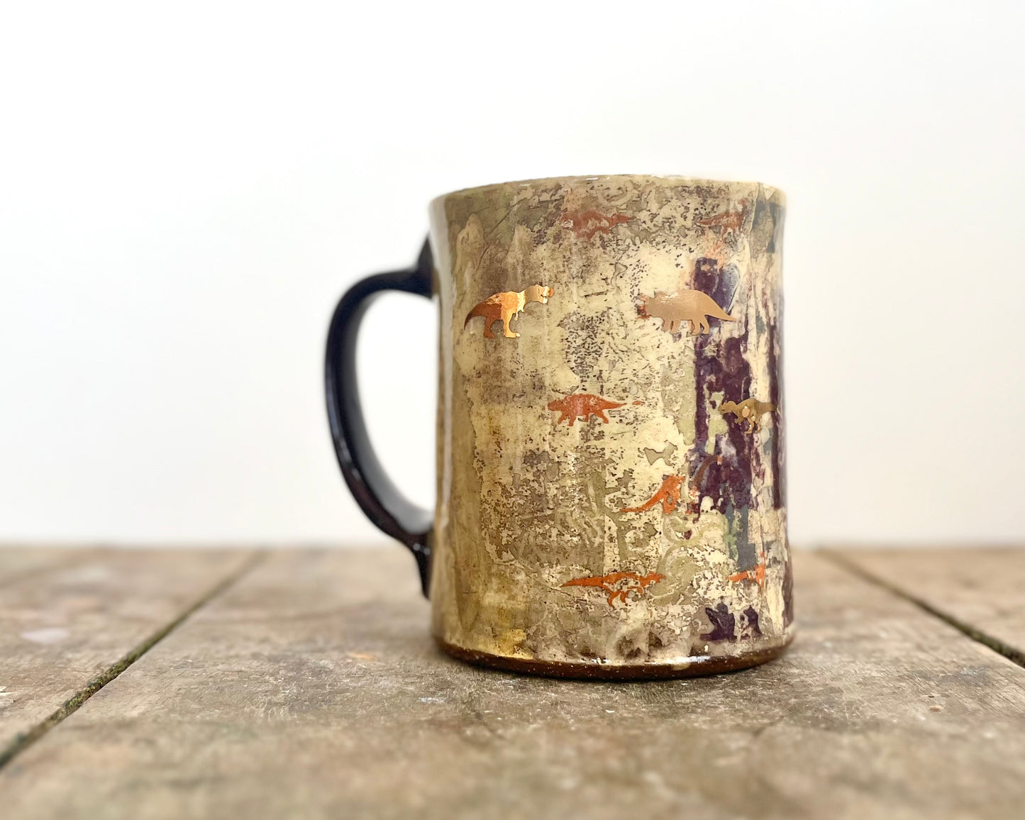 Mug with slip, gold decals and image transfer