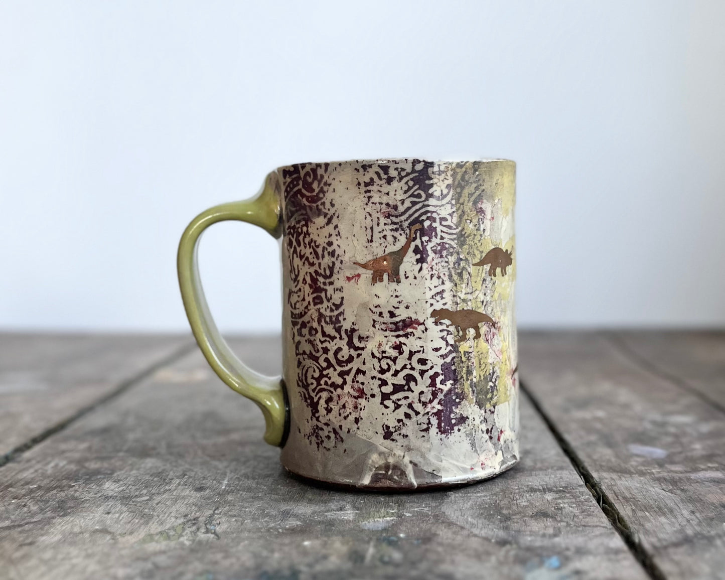 Mug with slip, gold decals and image transfer