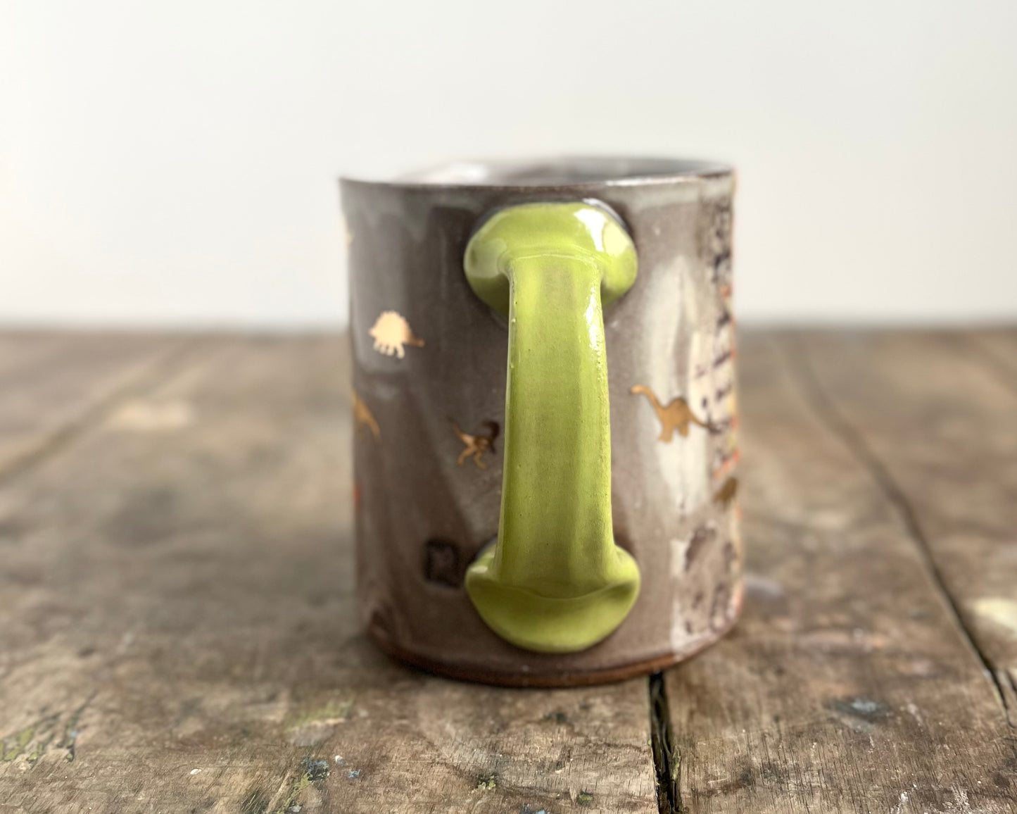 Mug with slip, gold decals and image transfer