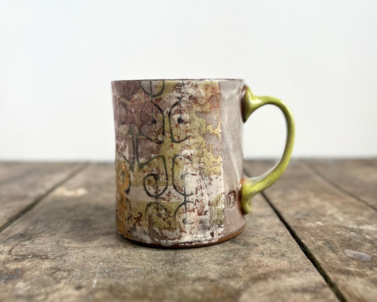 Mug with slip, gold decals and image transfer