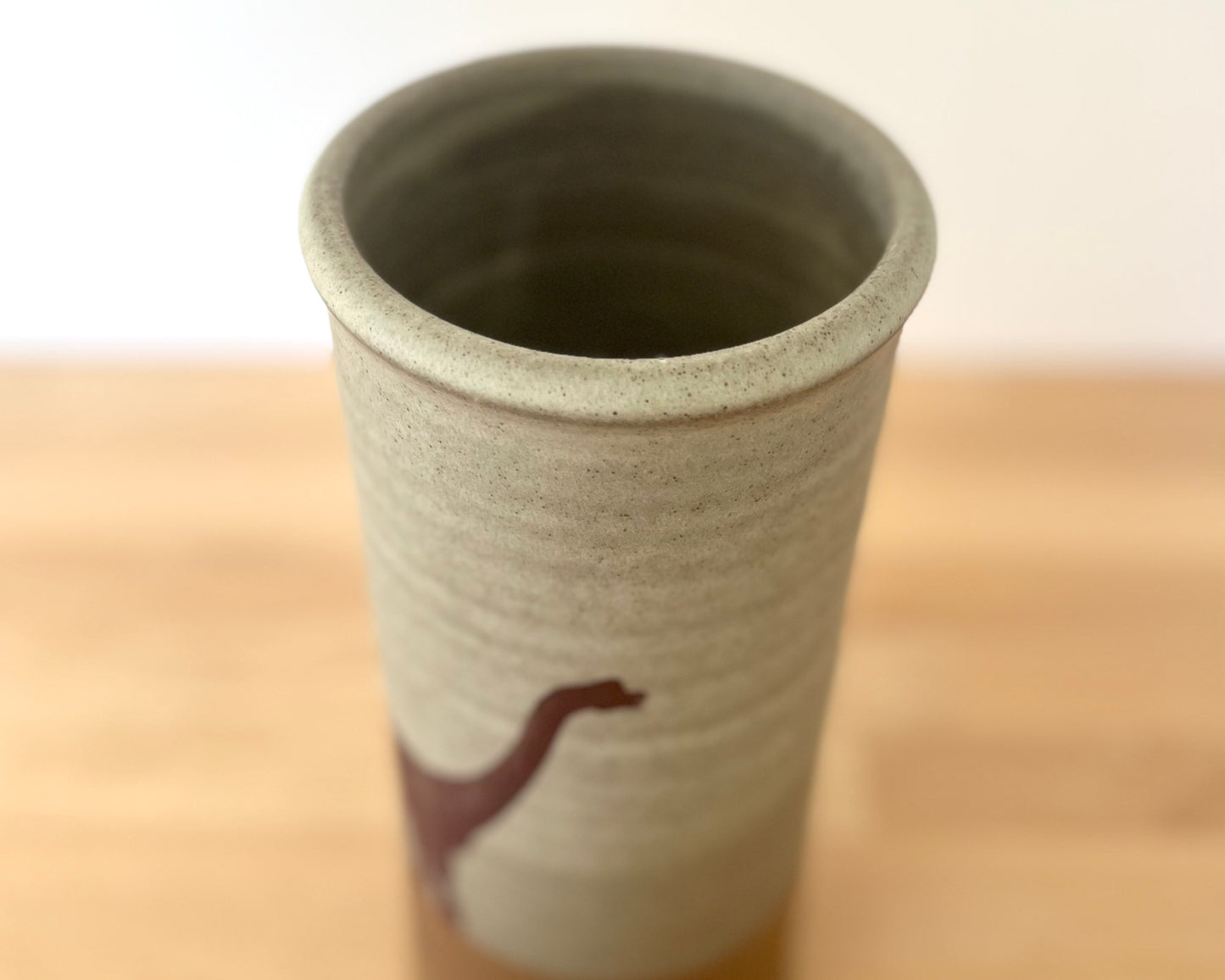 Cylindrical Vase with brachiosaurus- warm grey matte