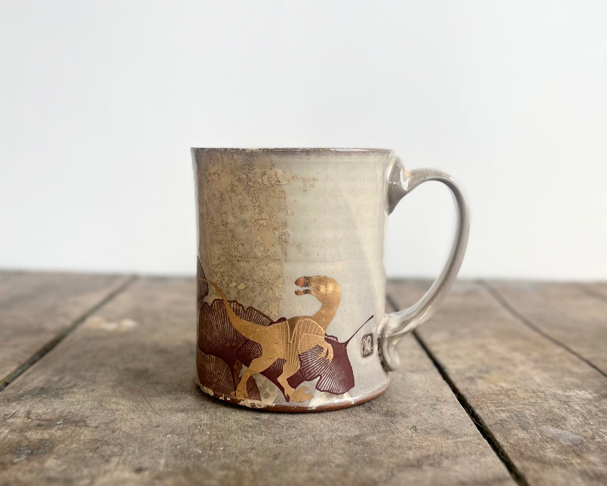 White Mug with slip, gold velociraptor and image transfer