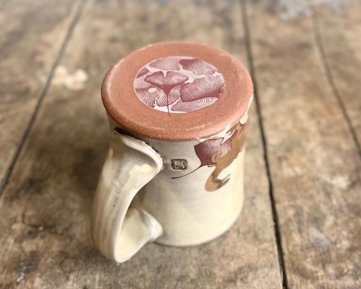 White Mug with slip, gold velociraptor and image transfer