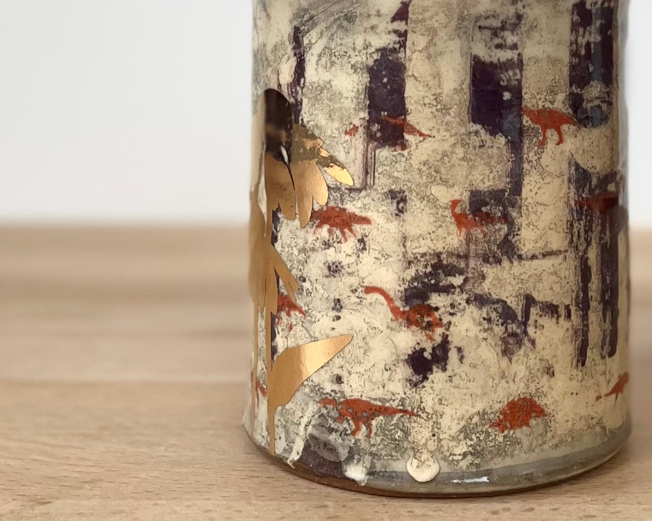 Mug with slip, gold decals and image transfer