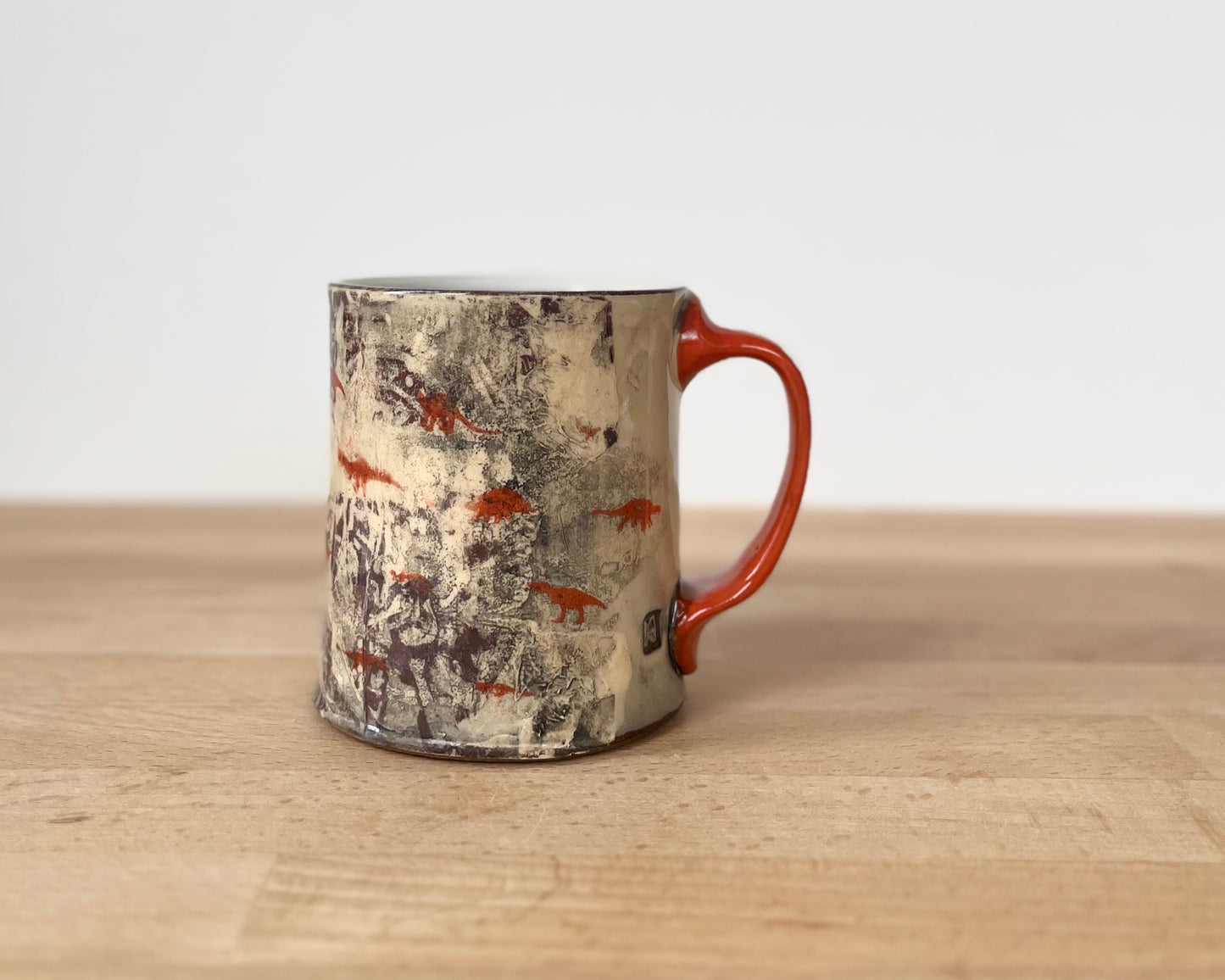 Mug with slip, gold decals and image transfer