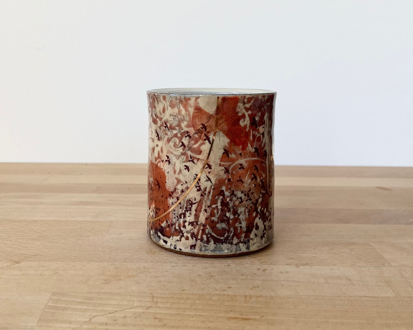 Mug with slip, gold decals and image transfer