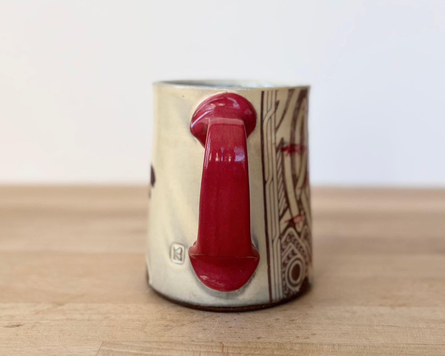 Mug with small red dinos with T-Rex