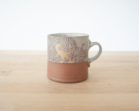 Gold Velociraptor Mug with textures and matte grey glaze