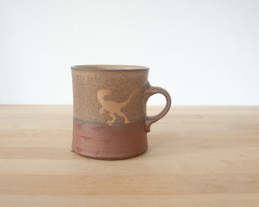 Gold Velociraptor Mug with matte brown glaze