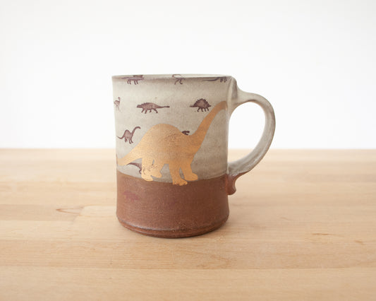 Gold Diplodocus mug with little dinosaurs - matte grey