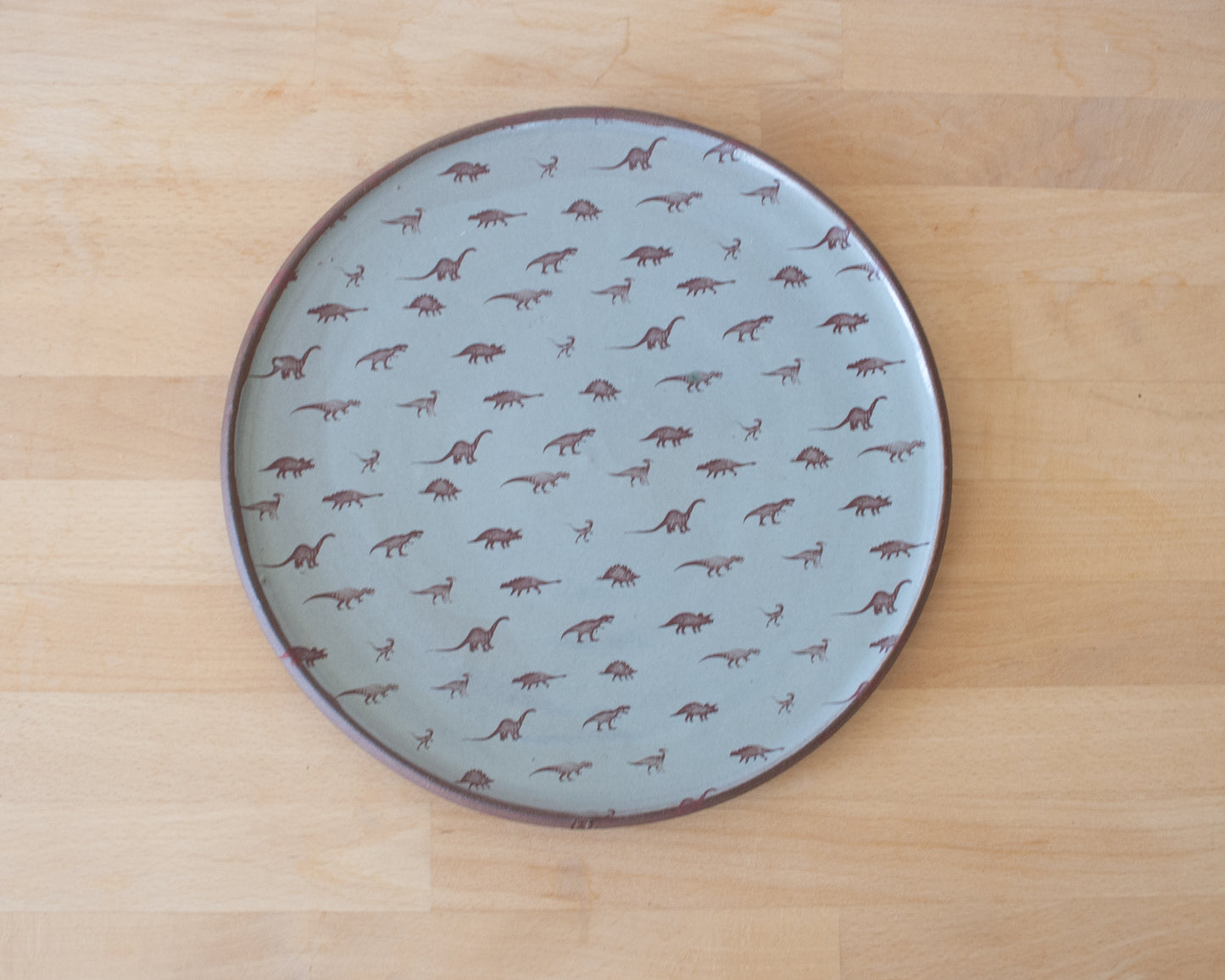 Plate with small dinosaur pattern - blue