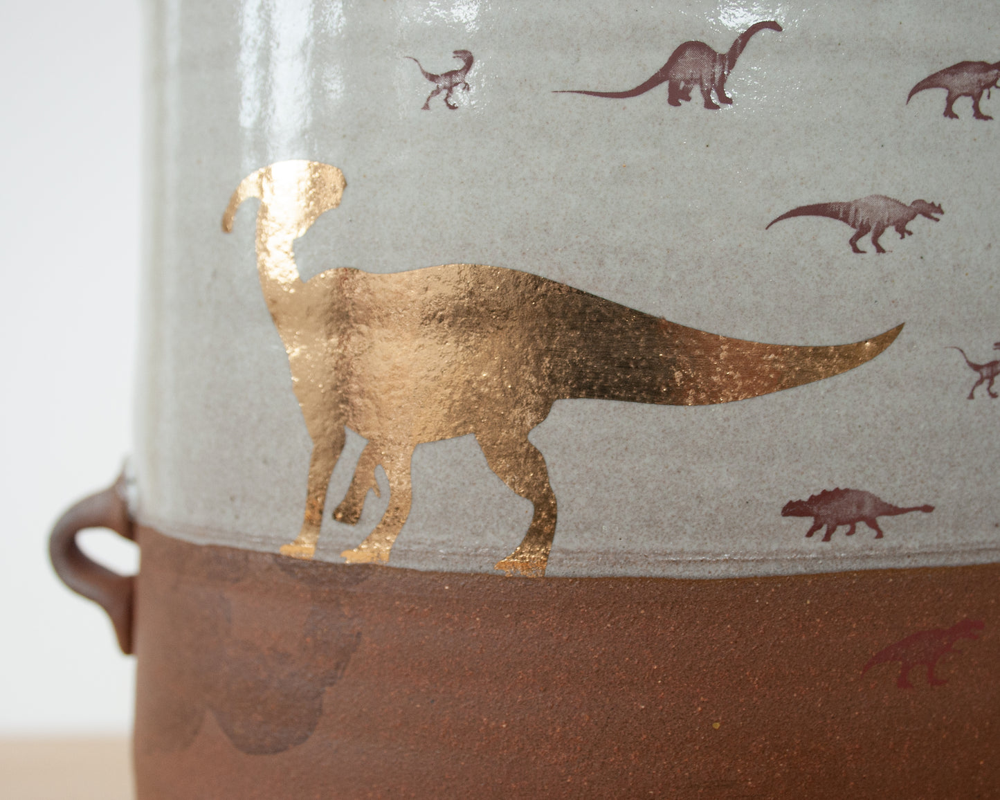 Gold Parasaurolophus Oval Vase with little dinosaurs and handles