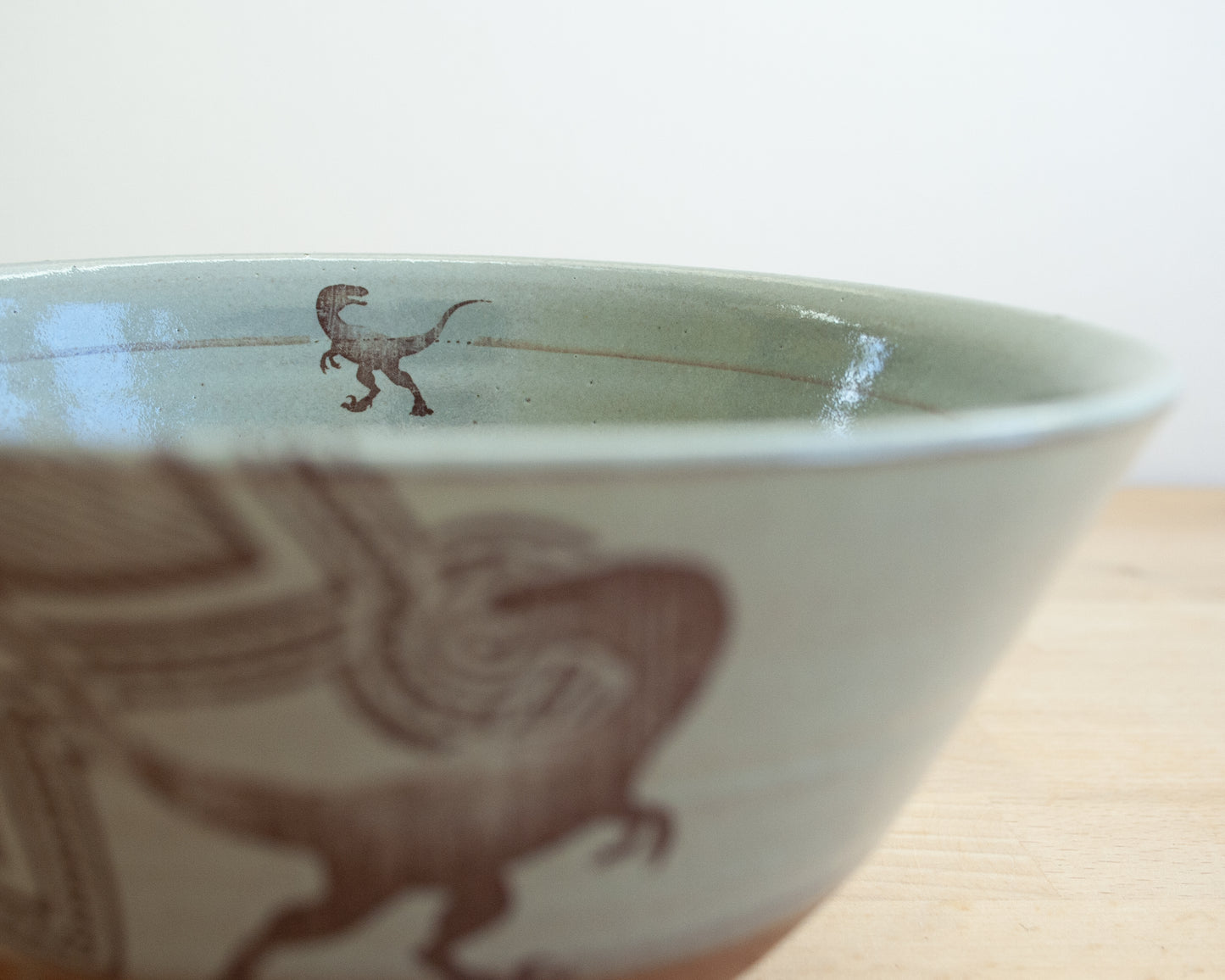 Velociraptor Bowl with background pattern- blue